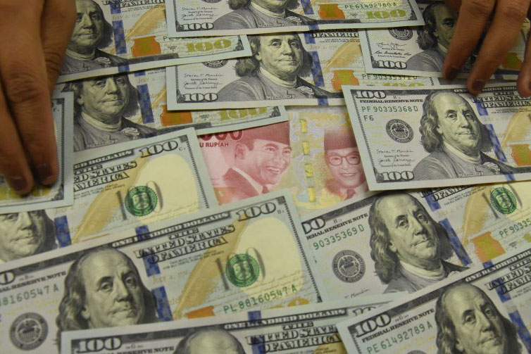 Rupiah Senin pagi melemah 2 poin