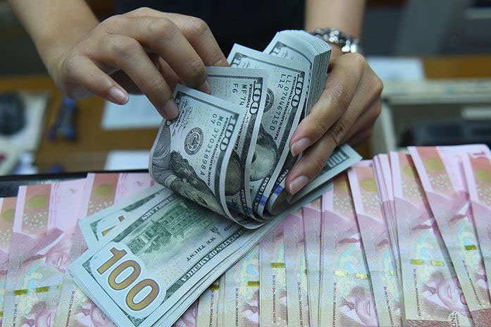 Rupiah Rabu pagi melemah 8 poin