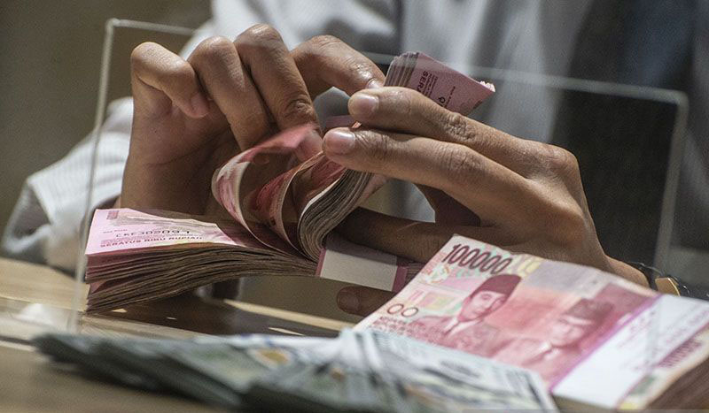 Rupiah Jumat pagi melemah 12 poin