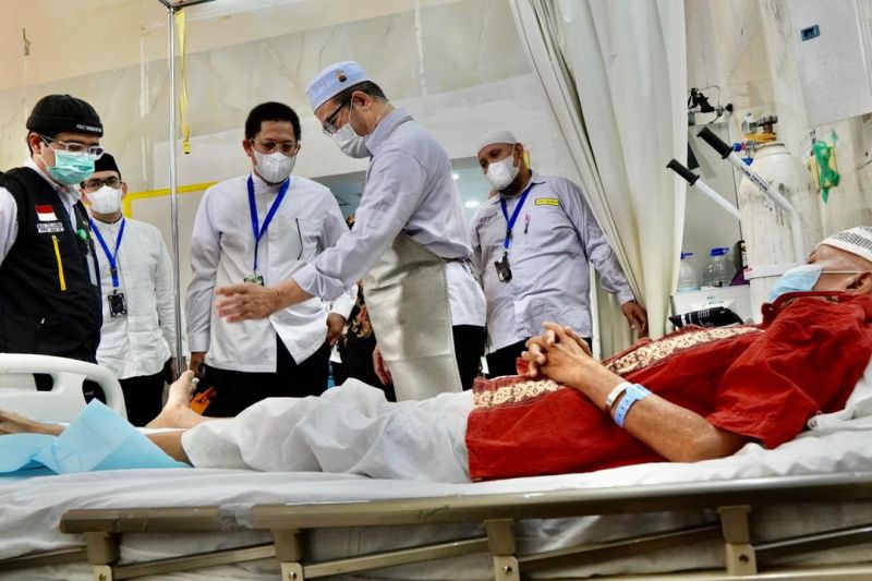 Jemaah diskrining kesehatan saat kedatangan di bandara debarkasi Jemaah diskrining kesehatan saat kedatangan di bandara debarkasi