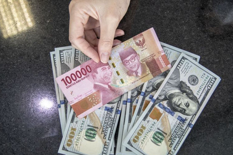 Rupiah Rabu pagi melemah 2 poin