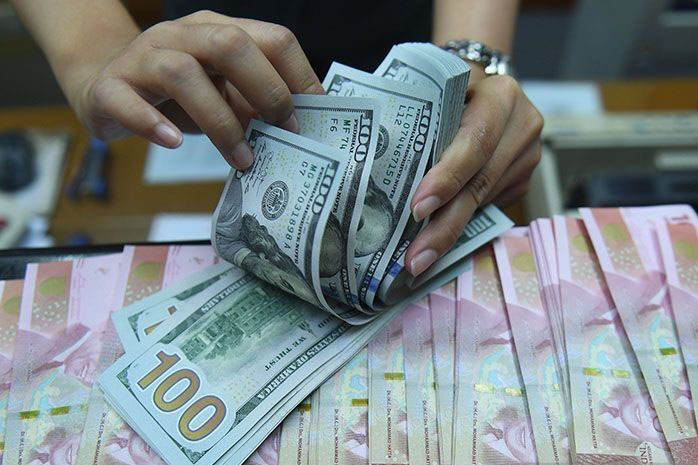 Rupiah Senin pagi melemah tujuh poin