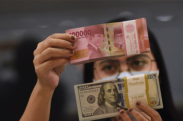 Rupiah Kamis pagi menguat 14 poin
