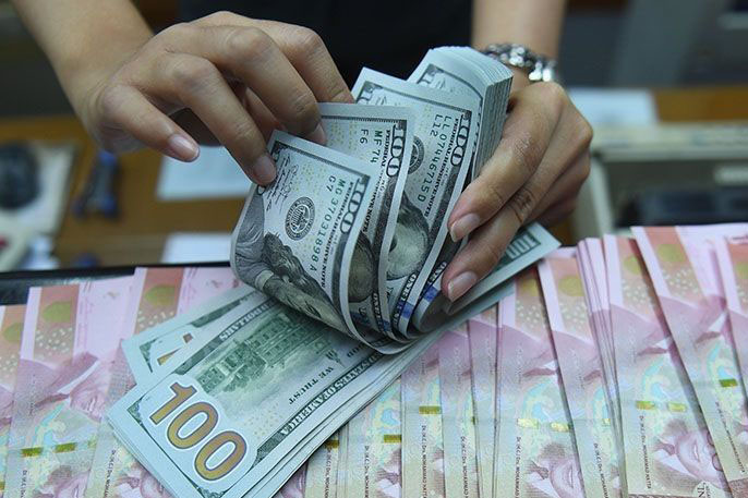 Rupiah Kamis pagi melemah 77 poin