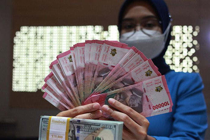 Rupiah Jumat naik jadi Rp14.694