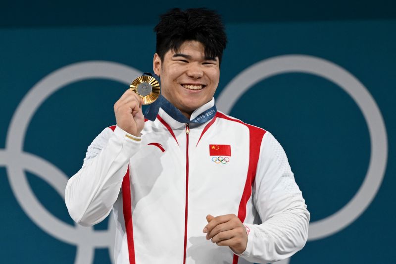Liu Huanhua antar China kembali tambang emas dari angkat besi Liu Huanhua antar China kembali tambang emas dari angkat besi