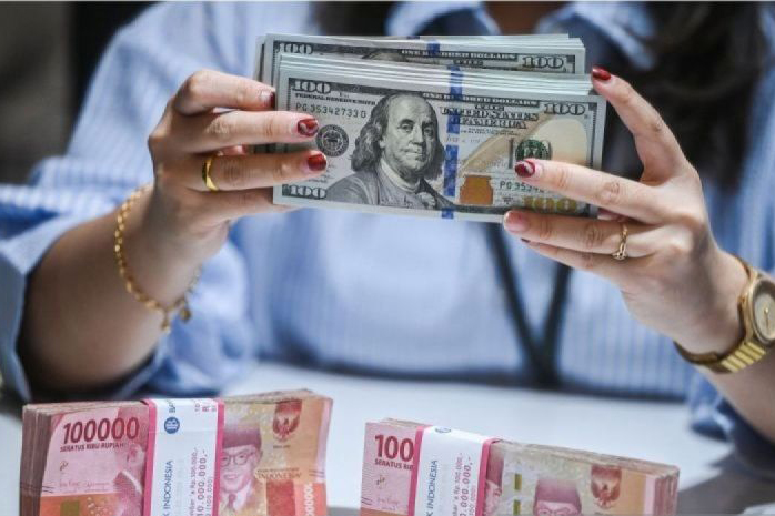 Rupiah Jumat turun 17 poin menjadi Rp15.715 per dolar AS Rupiah Jumat turun 17 poin menjadi Rp15.715 per dolar AS