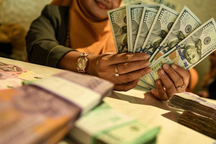Rupiah Rabu pagi turun 4 poin menjadi Rp15.210 per dolar AS Rupiah Rabu pagi turun 4 poin menjadi Rp15.210 per dolar AS