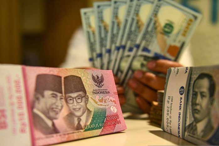 Rupiah Rabu melemah 38 poin menjadi Rp15.605 per dolar AS Rupiah Rabu melemah 38 poin menjadi Rp15.605 per dolar AS