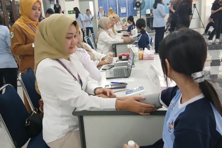 Penanganan kasus gigi berlubang pada anak melalui program CKG