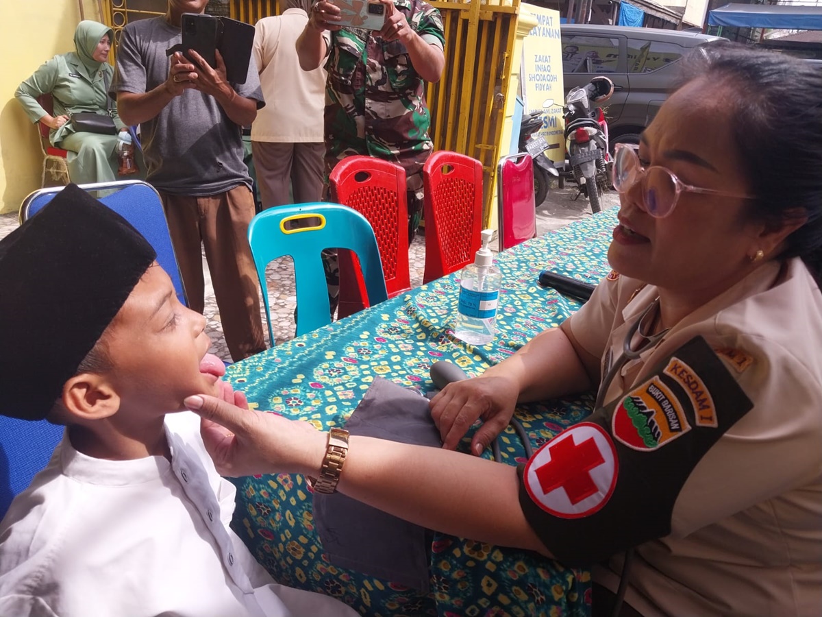 Sambut HUT ke-75 Kodam I/BB, Infolahtadam-I/BB santuni anak yatim dan pengobatan gratis Sambut HUT ke-75 Kodam I/BB, Infolahtadam-I/BB santuni anak yatim dan pengobatan gratis
