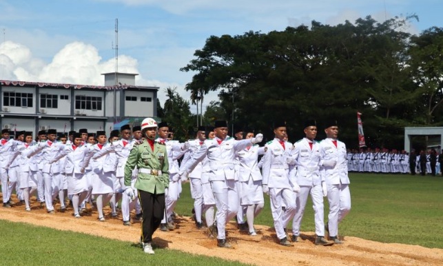 Karisto, Afgan, dan Frans, tiga putera Papua penjaga Sang Merah Putih Karisto, Afgan, dan Frans, tiga putera Papua penjaga Sang Merah Putih