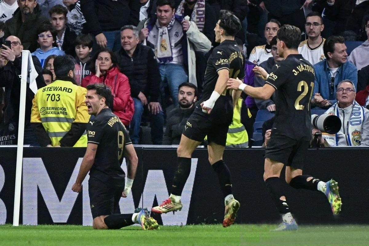 Valencia curi kemenangan 2-1 saat melawat ke kandang Real Madrid Valencia curi kemenangan 2-1 saat melawat ke kandang Real Madrid