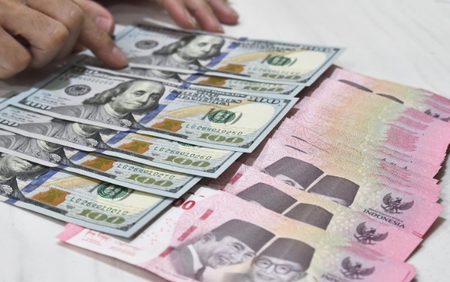 Rupiah melemah seiring dampak dari penguatan indeks dolar AS Rupiah melemah seiring dampak dari penguatan indeks dolar AS