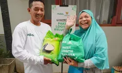 BAZNAS - MBAStack Ltd distribusi paket logistik untuk keluarga rentan di Jakarta