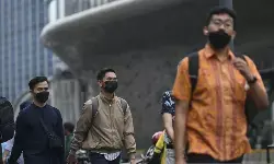 Pakai masker bila kondisi tubuh kurang fit selama liburan