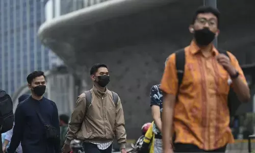 Pakai masker bila kondisi tubuh kurang fit selama liburan