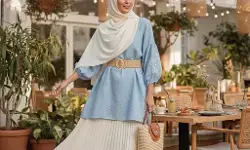 Tips padu padan tunik dan rok plisket untuk acara bukber