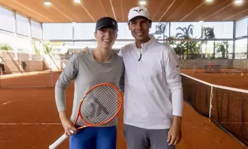 Nadal habiskan waktu di lapangan bersama Swiatek